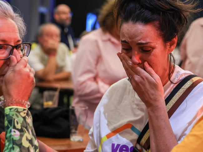 SYDNEY, AUSTRALIA - OCTOBER 14: A Yes supporter reacts at the Inner West for 'Yes2023' official referendum function at Wests Ashfield Leagues Club on October 14, 2023 in Sydney, Australia. A referendum for Australians to decide on an indigenous voice to parliament was held on October 14, 2023 and compelled all Australians to vote by law. Early voting began on Oct. 2, and activity has been intensifying in both the YES and NO camps, with multiple polls showing the YES campaign headed for defeat nationally. Australia requires a "double majority" of both the states and voters across the country to trigger constitutional changes, with most referendums in the past having failed. (Photo by Jenny Evans/Getty Images)