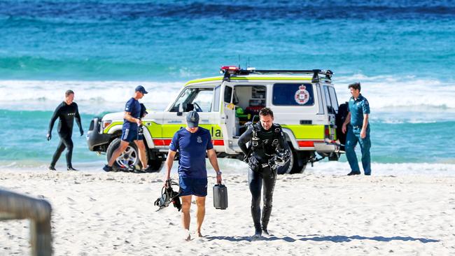 Emergency services on site after Alex Pullin was pulled from the water. Picture: Nigel Hallett