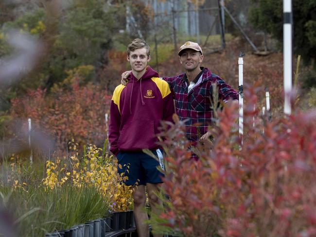 The Gould family at their nursery ÃGoulds NurseryÃ in Batlow, NSW. The nursery has been owned by Jamie and Rebekah Gould for 18 years and was saved in January from a bushfire. Jamie, his sons and daughter all had a hand in defending their home and the nursery. Since covid-19, the nursery has seen a rise in business activity from people in isolation. L to R: Jack Gould 17yo with his dad Jamie Gould. Picture by Sean Davey