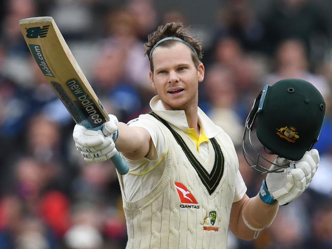 Australia's Steve Smith celebrates making 100 runs on the second day of the fourth Ashes cricket Test match between England and Australia at Old Trafford in Manchester, north-west England on September 5, 2019. (Photo by Paul ELLIS / AFP) / RESTRICTED TO EDITORIAL USE. NO ASSOCIATION WITH DIRECT COMPETITOR OF SPONSOR, PARTNER, OR SUPPLIER OF THE ECB