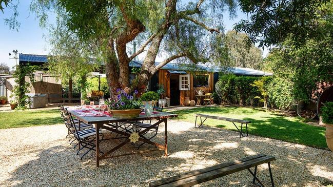 A shaded area near the separate studio, which would serve as an ideal work from home space or showroom.