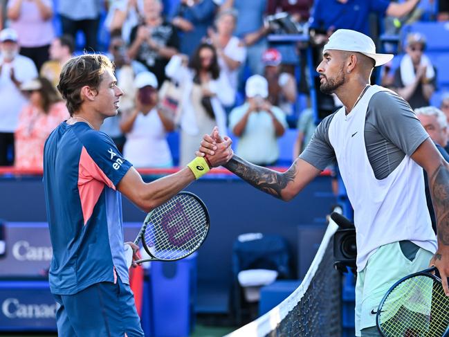 MONTREAL, QUEBEC - AUGUST 11: Alex de Minaur of Australia congratulates Nick Kyrgios of Australia for his victory during Day 6 of the National Bank Open at Stade IGA on August 11, 2022 in Montreal, Canada. Minas Panagiotakis/Getty Images/AFP == FOR NEWSPAPERS, INTERNET, TELCOS &amp; TELEVISION USE ONLY ==