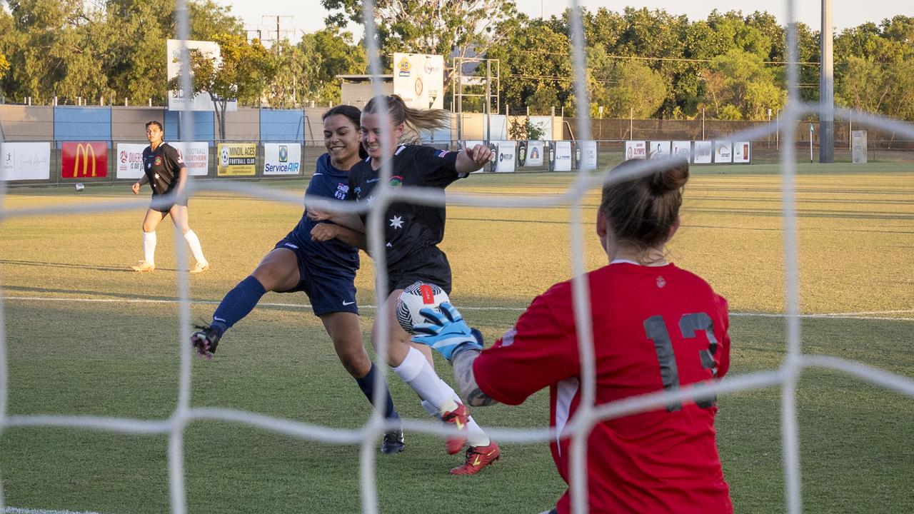 A US Marine desperately defends her goal. Picture: Supplied.