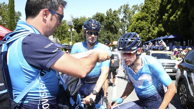 CYCLING - TOUR DOWN UNDER STAGE 2 - Unley to Stirling. Movistar riders cool off after the race. Jasha Sutterlin (left) and Nuno Matos (right) get cooled down after the race. Picture Sarah Reed