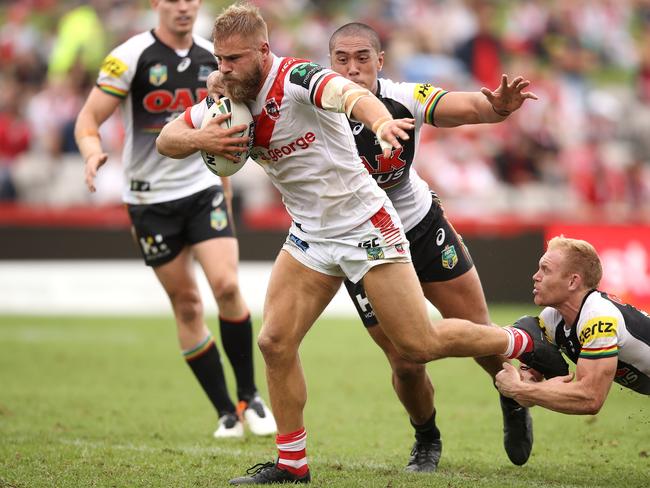 Jack de Belin charges forward for the Dragons.