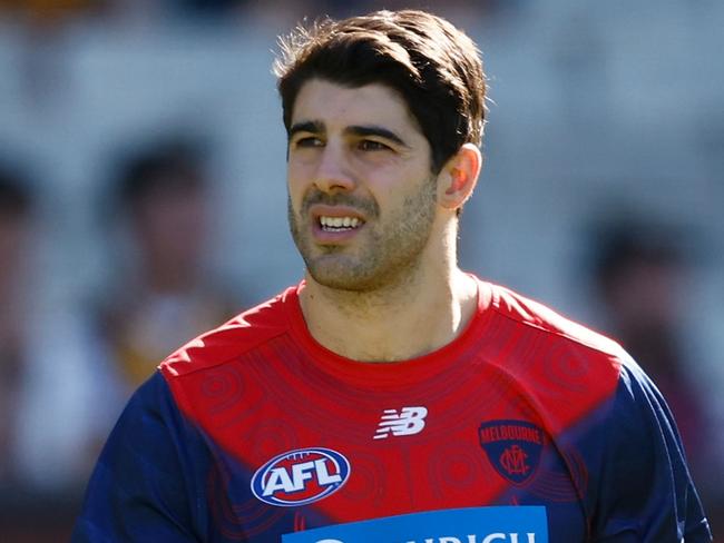 MELBOURNE, AUSTRALIA - MARCH 23: Christian Petracca of the Demons warms up during the 2024 AFL Round 02 match between the Hawthorn Hawks and the Melbourne Demons at the Melbourne Cricket Ground on March 23, 2024 in Melbourne, Australia. (Photo by Michael Willson/AFL Photos via Getty Images)