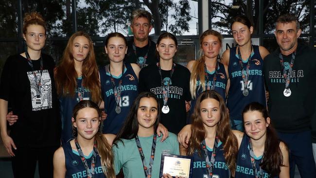 The Ballina Breakers under-18 girls team. Front (left to right): Coco Gallager, Nina Aboitiz, Madeleine Alexander, Madison Smith. Centre: Sasha Oxland, Neeve Alexander, Sally Crethar, Leura Allen, Lily Beadham, Pippa Bailey, Marty Smith (coach). Back: Simon Bailey (assistant coach).