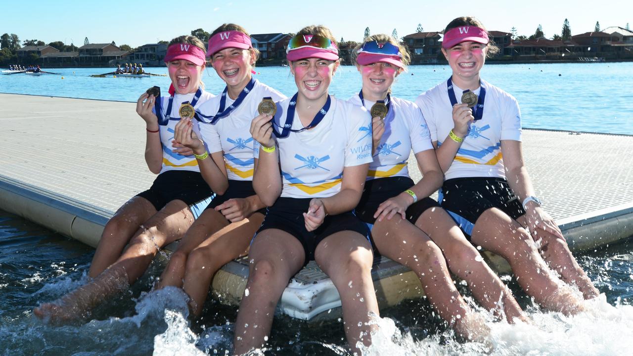 Wilderness Rowing Club l-r Bridge Williams, 12, Zali Detmold, 13, Lily Nicholls, 13, Isobel Flowers, 12, and Amelia Adam, 13, with their gold medals. Picture: Michael Marschall