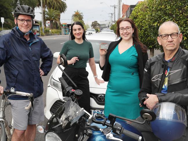 L to R Kirk O'Dwyer on bicycle, Sam Landy driving car, Phillippa Butt catching train and Ian Royall on a motorbike for the commuter challenge from Essendon to Southbank. Tuesday, September 19, 2023. Picture: David Crosling