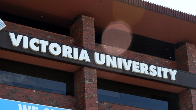 A former Victoria University staffer has taken legal action against the uni after he was sacked for storing illicit photos on his work computer.