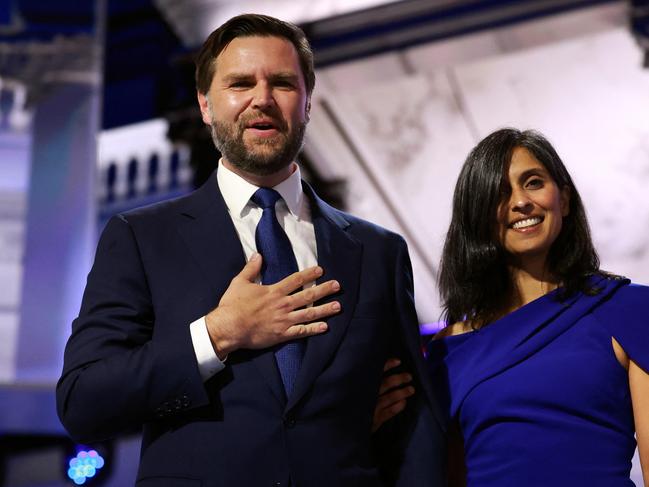 MILWAUKEE, WISCONSIN - JULY 17: Republican vice presidential candidate, U.S. Sen. J.D. Vance (R-OH) is joined by his wife Usha Chilukuri Vance on stage on the third day of the Republican National Convention at the Fiserv Forum on July 17, 2024 in Milwaukee, Wisconsin. Delegates, politicians, and the Republican faithful are in Milwaukee for the annual convention, concluding with former President Donald Trump accepting his party's presidential nomination. The RNC takes place from July 15-18.   Joe Raedle/Getty Images/AFP (Photo by JOE RAEDLE / GETTY IMAGES NORTH AMERICA / Getty Images via AFP)