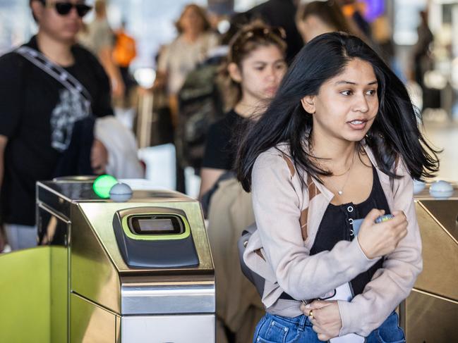 A NEW operator for Victoria's troubled Myki system will be announced today. Commuters use Myki cards at Flinders Street Station. Picture: Jake Nowakowski