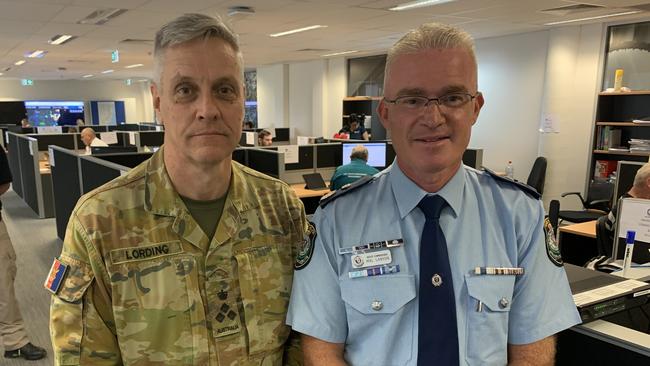 Australian Defence Force NSW Flood Assist commander Brigadier Rob Lording and NSW Police Force officer Deputy Commissioner Mal Lanyon run a flood recovery co-ordination centre at Southern Cross University.