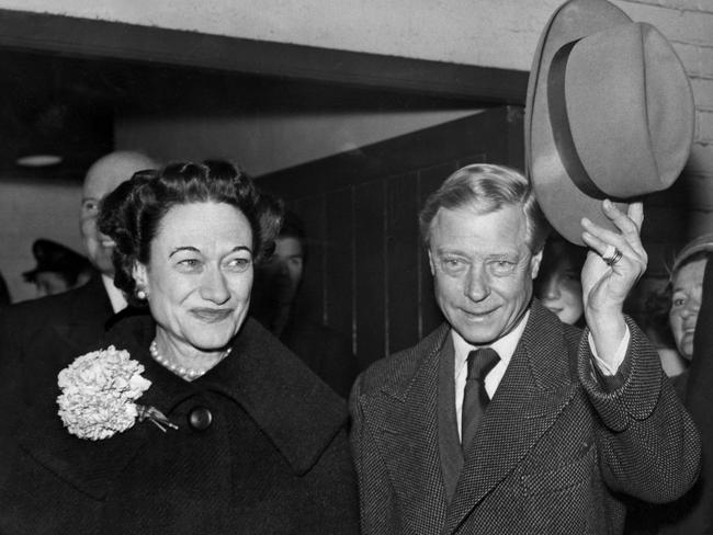 Edward, Duke of Windsor (R), with his wife the Duchess Wallis of Windsor, had a difficult relationship with his younger brother, King George VI. (Photo by – / AFP)