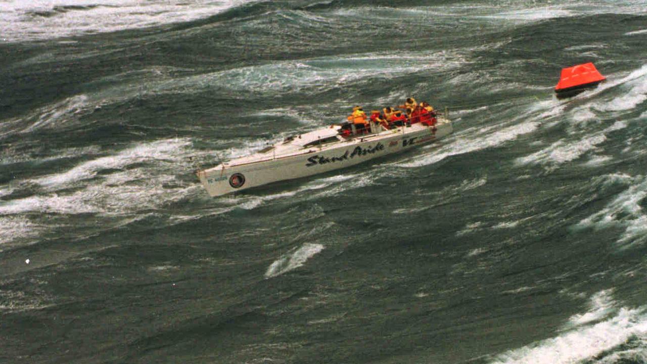 Crew waiting on a dismasted yacht for rescue in 1998.