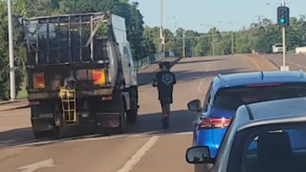 Reckless e-scooter stunt: Kids risk lives on busy Darwin road