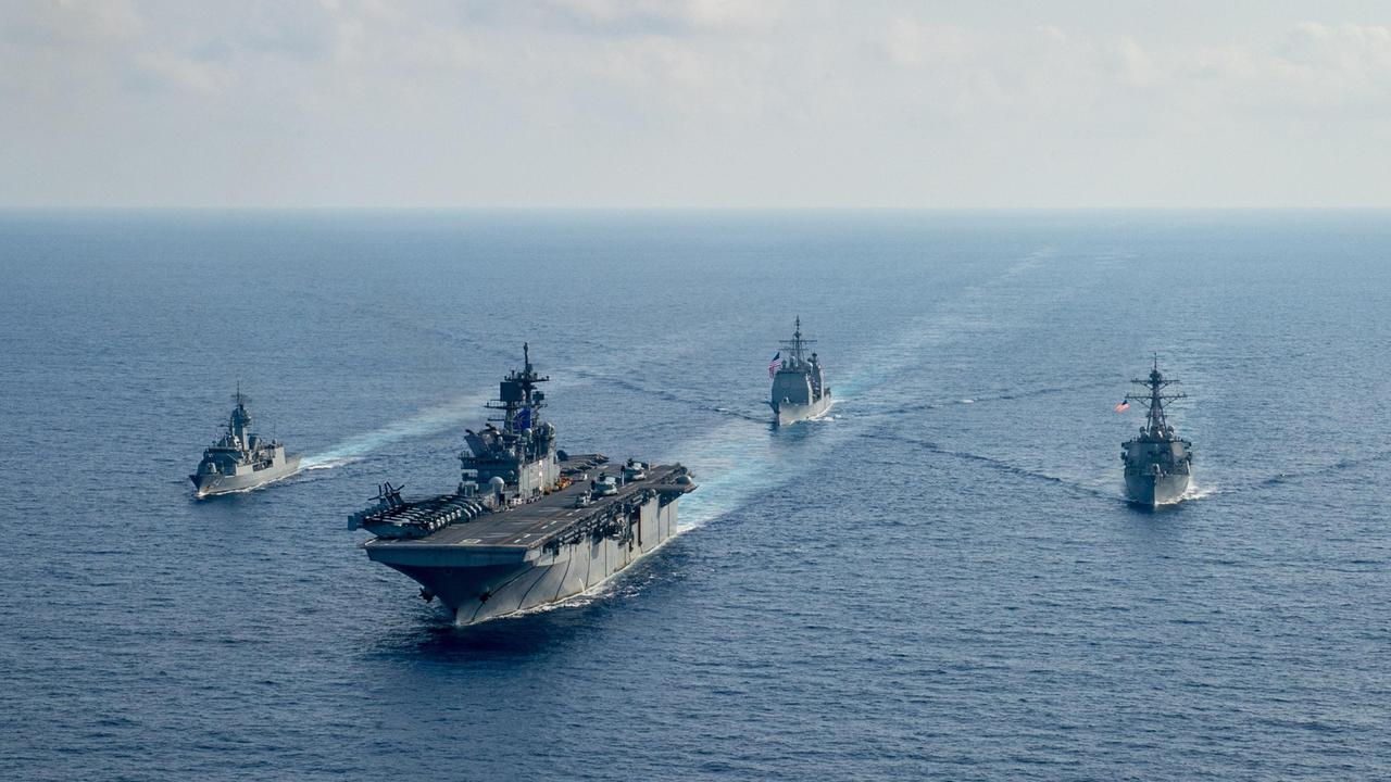 Royal Australian Navy helicopter frigate HMAS Parramatta conducts officer of the watch manoeuvres with amphibious assault ship USS America, guided-missile cruiser USS Bunker Hill and guided-missile destroyer USS Barry in the South China Sea. Picture: Department of Defence