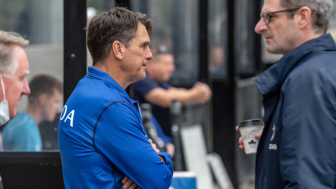 Paul Roos keeps an eye on Kangaroos training. Picture: Jason Edwards