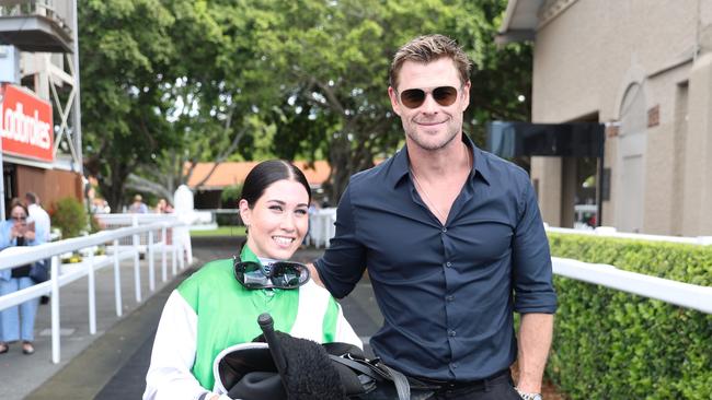 Superstar actor Chris Hemsworth congratulates young jockey Courtney Bellamy on her first Saturday winner at Eagle Farm. Picture: Supplied,