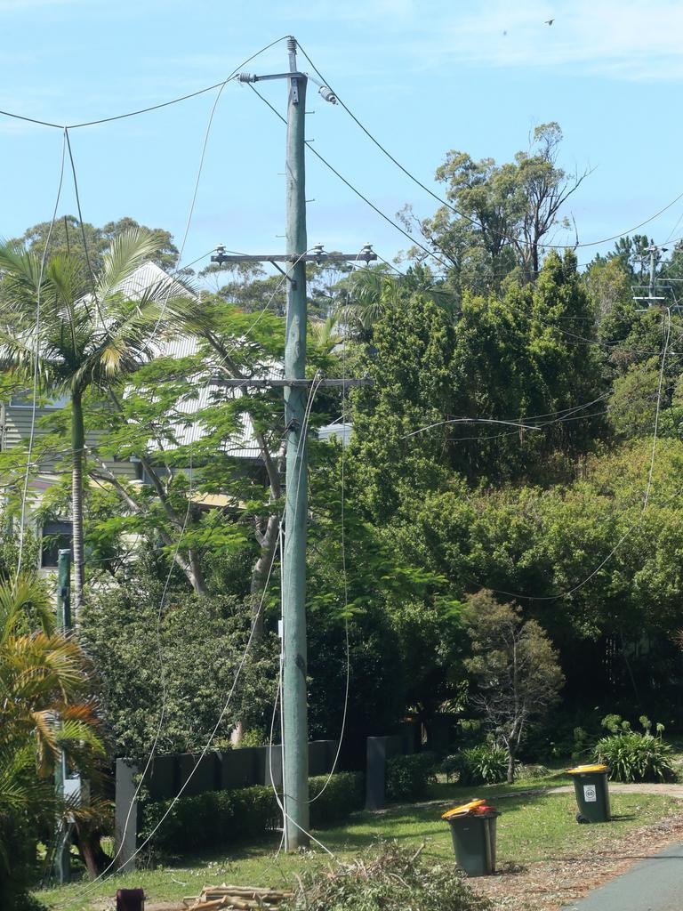 Fallen power lines and poles at Eagle Heights, Mt Tambourine after Christmas night storm. Picture: NCA NewsWire / Scott Powick