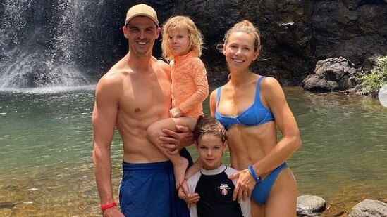 Collingwood captain Scott Pendlebury and his family pictured at a Fiji waterfall.