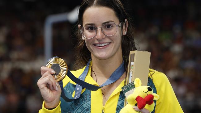 NCA. PARIS FRANCE. 2024 OLYMPIC GAMES. July 30 - Day 4.  Swimming finals at the Paris La Defense Arena.  Womens 100 mtr final.     Australian  Kaylee McKeown    with her gold medal after winning the 100 mtr backstroke   . Pic: Michael Klein