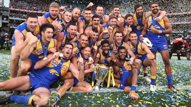 West Coast players celebrate with the premiership cup. Picture: Phil Hillyard