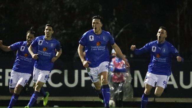 Avondale FC players celebrate a goal in the club’s FFA Cup quarter-final against Sydney FC. Picture: Getty Images.