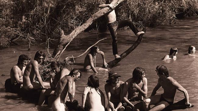 People enjoy a swim at the Sunbury Pop Festival in 1972.