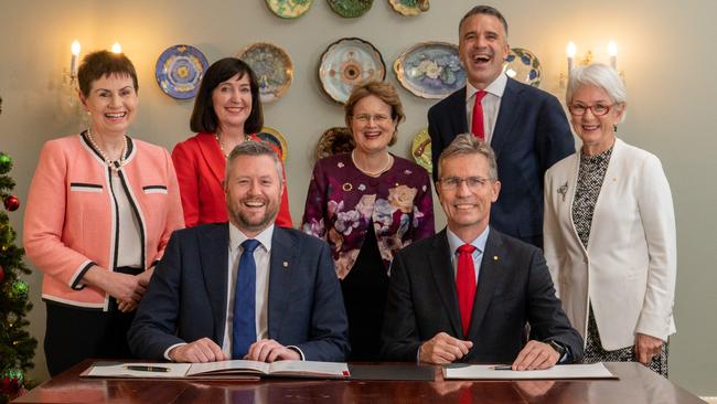 UniSA chancellor Pauline Carr (top left), Deputy Premier Susan Close, Governor Frances Adamson, Premier Peter Malinauskas, University of Adelaide chancellor Catherine Branson with (front left) UniSA vice-chancellor David Lloyd and University of Adelaide vice-chancellor Peter Hoj. Picture: Naomi Jellicoe