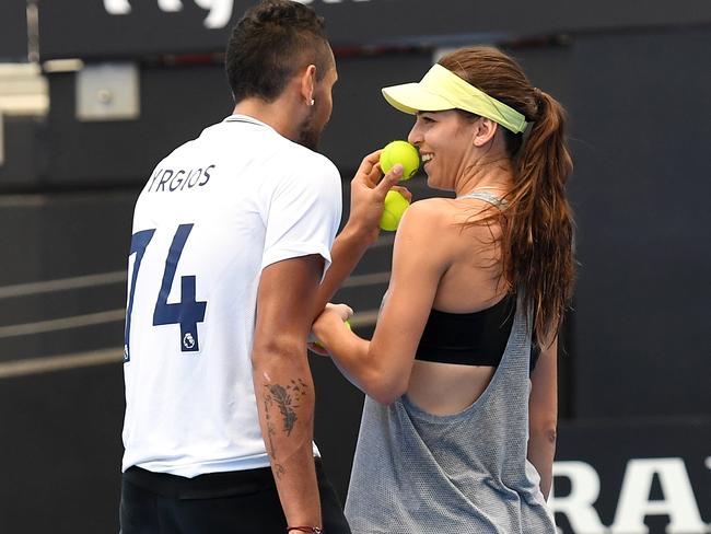 Nick Kyrgios and girlfriend Ajla Tomljanovic have a laugh during practice.