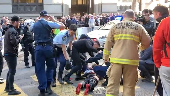 Firefighters and members of the public were involved in the arrest before police arrived on the scene. Picture: Marc Kean