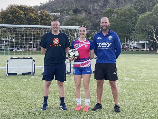 Lions FC coach Warren Moon with Brothers senior player Lily Falvey, 17, and Brothers football director Jeremy Brockie. Picture: Nic Darveniza