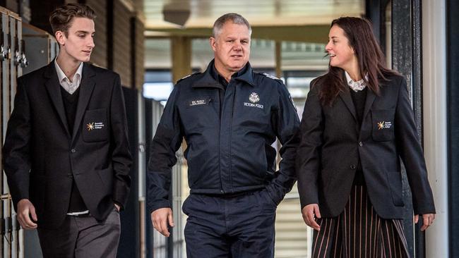 Sen Sgt Mal McKern with Jared and Maddy. Picture: Jake Nowakowski