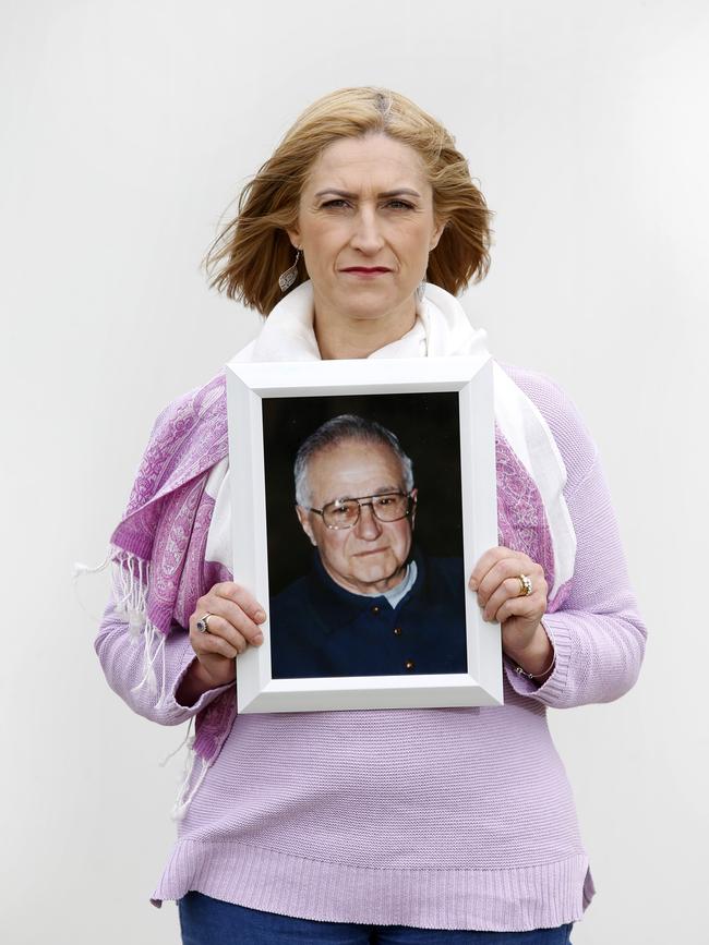 Sharon Woodward, with a picture of her father Sam Scicluna, 85. Picture: David Caird