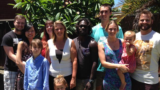 McDonald-Tipungwuti, mum Jane at his right, with family at Christmas 2014.