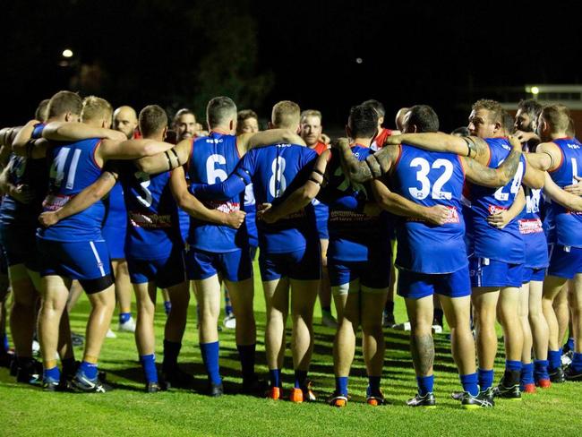 The Cobras gather before the game.