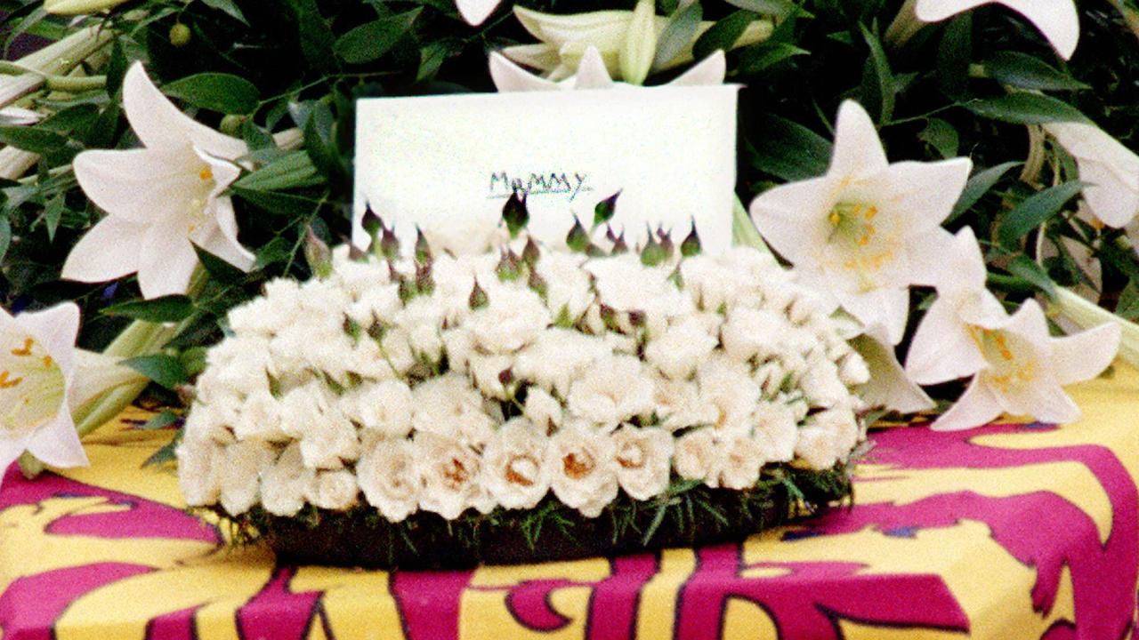 In this file photo taken on September 6, 1997, a message saying 'Mummy' sits on the coffin of Diana, Princess of Wales. Picture: Joel Robine/Pool/AFP