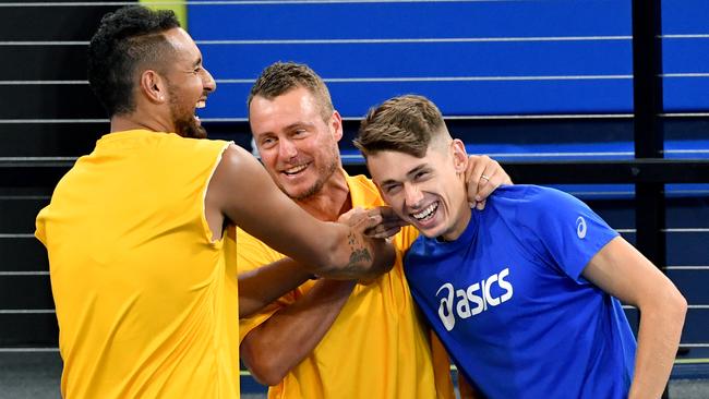 Australian team captain Lleyton Hewitt (centre) celebrates with Nick Kyrgios and Alex de Minaur. Pic: AAP