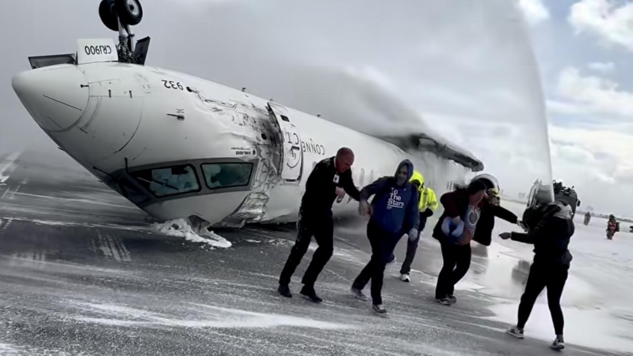 Images shot by passenger Pete Koukov who was on a Delta Air Lines plane that crashed while landing Monday afternoon at Toronto Pearson International Airport. Picture: Pete Koukov/@eggxit Instagram