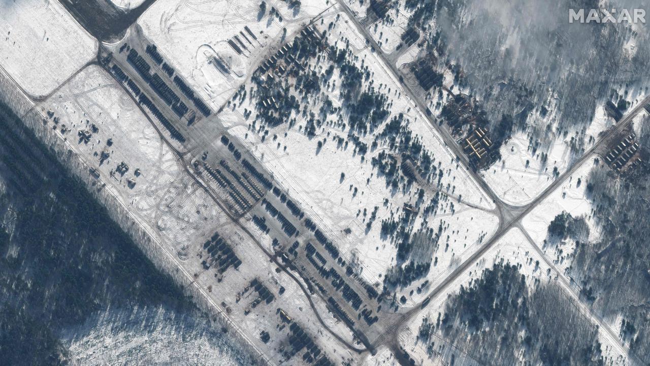 This satellite image released by Maxar Technologies shows an overview of deployed troops and equipment in Zyabrovka airfield, near Gomel in Belarus on February 10, 2022. Picture: AFP / Satellite image