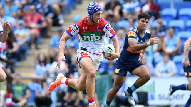 Kalyn Ponga goes on the burst. Picture: Bradley Kanaris/Getty Images