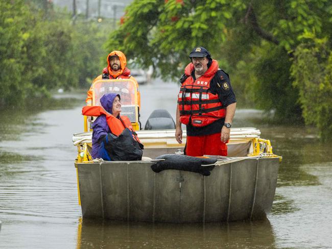 Resident evacuated by SES in Gray St, Carina, on Sunday. Picture: Richard Walker/RDW Photography