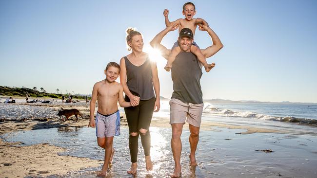 Jocelyn and Brett Williams, from Wagga Wagga in the NSW Riverina, holidaying Byron Bay with Jax, 8, and Mack, 6. Picture: Luke Marsden