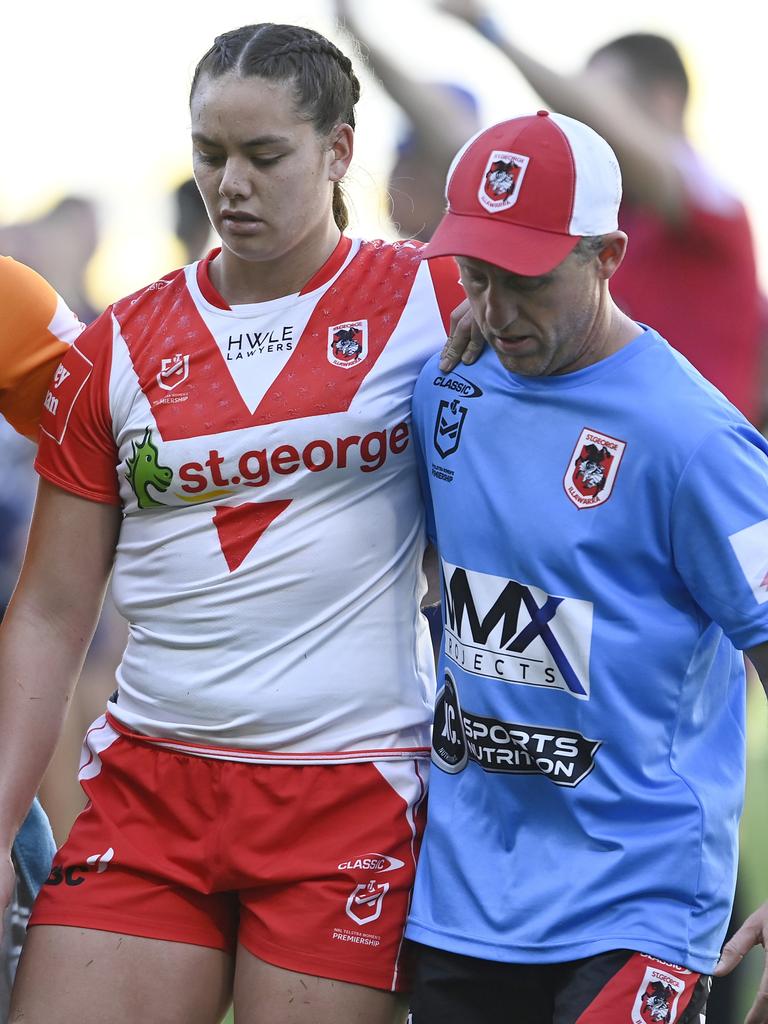 Alexis Tauaneai leaves the field. Picture: Ian Hitchcock/Getty