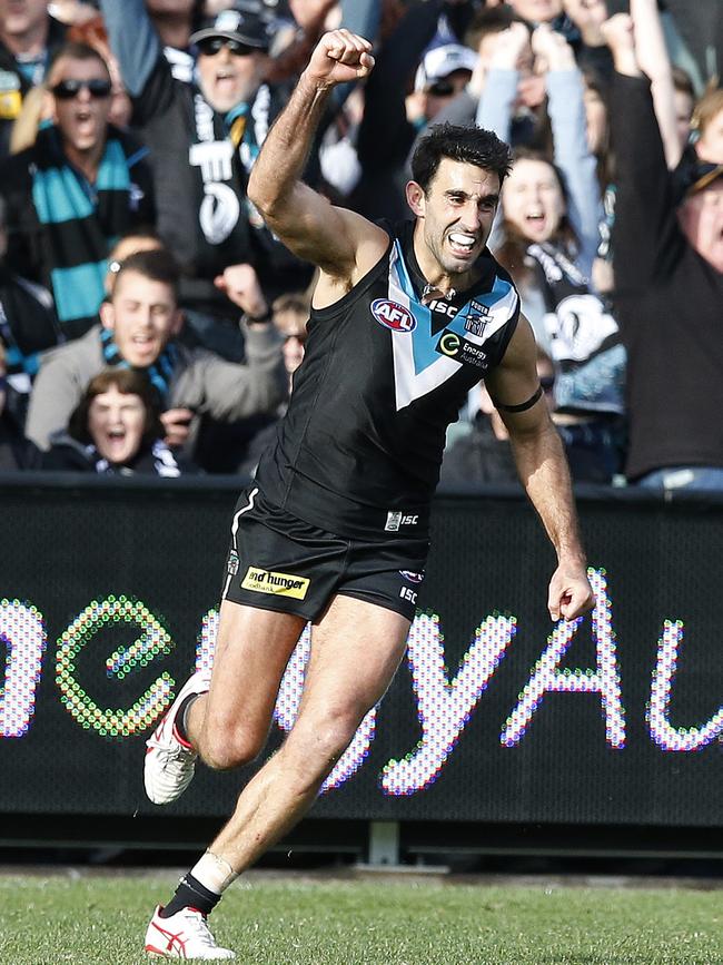 Dom Cassisi celebrates as the final siren sounds to send him into retirement as a winner. Picture: Sarah Reed