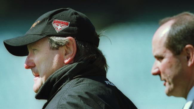 Essendon coach Kevin Sheedy and chief executive Peter Jackson watch training in 2001.