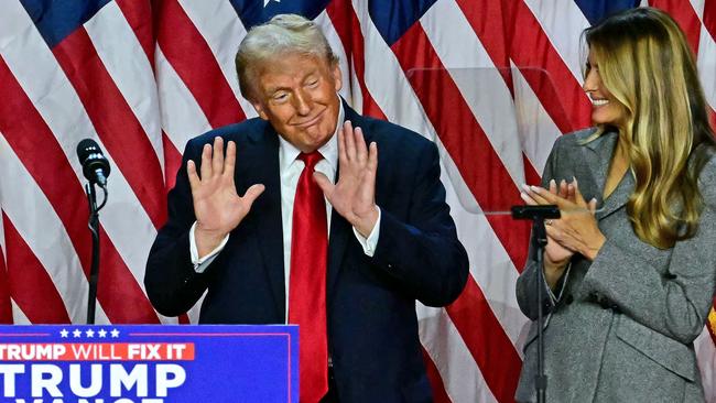 TOPSHOT - Former US President and Republican presidential candidate Donald Trump gestures after speaking during an election night event at the West Palm Beach Convention Center in West Palm Beach, Florida, on November 6, 2024. Republican former president Donald Trump closed in on a new term in the White House early November 6, 2024, just needing a handful of electoral votes to defeat Democratic Vice President Kamala Harris. (Photo by Jim WATSON / AFP)