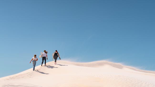 Shannon Meyerkort and her daughters at The Lancelin sand dunes in WA