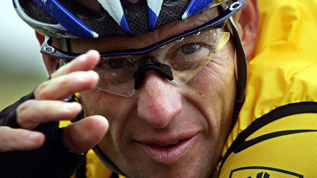 08/07/2004 WIRE: (FILES) - A file picture taken on July 8, 2004 of US cyclist Lance Armstrong during the fifth stage of the 91st Tour de France cycling race between Amiens and Chartres. Armstrong could lose much more than his already ravaged reputation if he confesses to doping this week during a television interview scheduled to air on January 17, 2013 with Oprah Winfrey -- he could end up in jail. The disgraced Texan's decision to talk to the famed US talk show host has divided opinion, as some say he needs to do something radical to rehabilitate his public profile, while others say speaking out will only make matters once. The crux of the matter is whether Armstrong, having been stripped of his seven Tour de France titles, will finally admit that he was a drugs cheat. Such a confession would overturn more than a decade of strenuous denials. AFP PHOTO/FILES/JOEL SAGET Pic. Afp